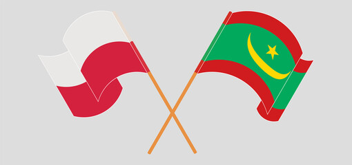 Crossed and waving flags of Poland and Mauritania