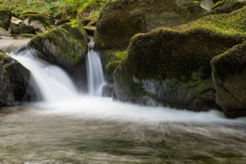 Long exposure of a waterfall on the East Lyn River at Watersmeet in Exmoor National Park