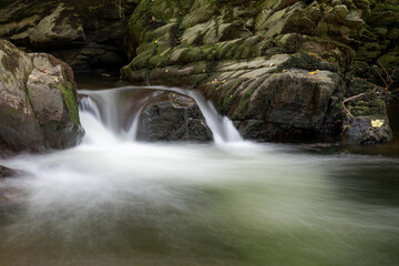 Long exposure of a waterfall on the East Lyn River at Watersmeet in Exmoor National Park