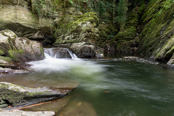 Long exposure of a waterfall on the East Lyn River at Watersmeet in Exmoor National Park