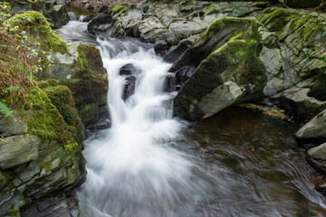 Long exposure of a waterfall on the East Lyn River at Watersmeet in Exmoor National Park