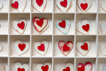 wooden hearts in a box with squares