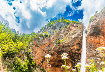 Rinka waterfall located in Logarska dolina national park in Slovenia, Second highest waterfall in Slovenia, Europe © streetflash