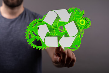 Mechanism, green metallic gears and cogs at work on brown background. Industrial machinery. 3D