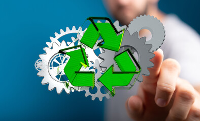 Mechanism green gears and cogs at work on black background. Industrial machinery