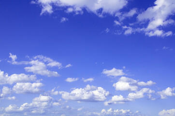 Naklejka na ściany i meble Cloudscape background blue sky with white clouds