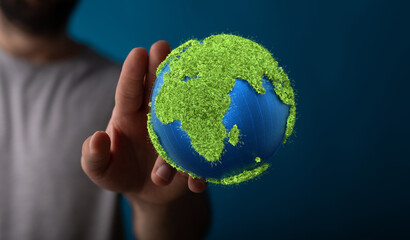 Ecology concept of green Earth globe made of leaves