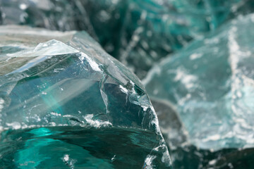 large Chunk of Aqua Glass Rock Slag for Garden decor. Glass in Nature Full frame texture top view