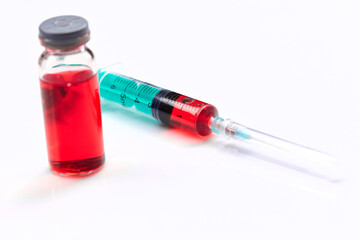  Vaccine in vial with syringe