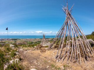 The Patio das Cabanas (Huts Courtyard) in Vila Cha, Esposende, Portugal. Wooden stick hut house,...