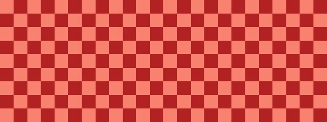 Checkerboard banner. Firebrick and Salmon colors of checkerboard. Small squares, small cells. Chessboard, checkerboard texture. Squares pattern. Background.