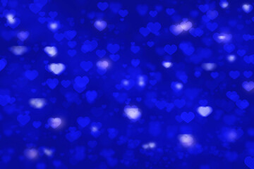 Heart shape bokeh blue background for valentines day greeting card or wallpaper