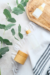 Natural skin care beauty products set on stone table. Organic cosmetics collection.