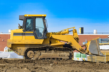 tractor on a construction site bulldozer work shovel