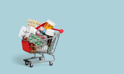 A supermarket trolley full of blister pills, home delivery of medicines. - obrazy, fototapety, plakaty