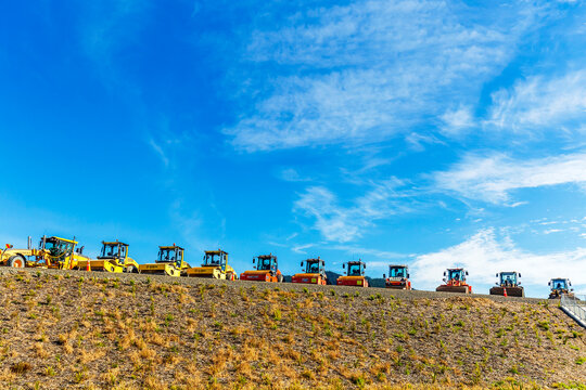 Te Horo, New Zealand - January 03, 2022: Parked Machinery Ready To Be Used Next To State Highway 1 In New Zealand