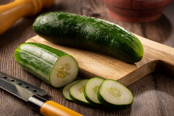 Fresh cucumber sliced ​​on the table.