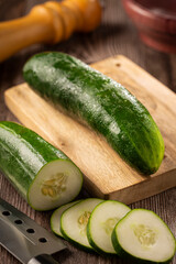 Fresh cucumber sliced ​​on the table.