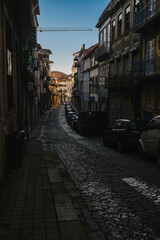 Fototapeta na wymiar A view of the one of the narrow streets in the old town of Porto, Portugal.