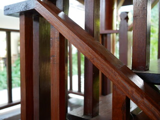 staircase and wooden railing handle for safety.	