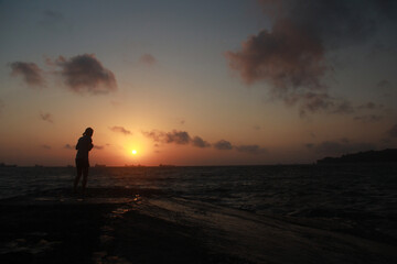 Amazing sunrise at Teluk Penyu beach in Cilacap Indonesia.
