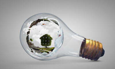 Green landscape inside light bulb