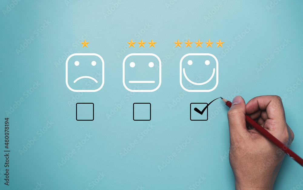 Poster hand tick or check mark to select smile face with five stars on blue background , customer and clien