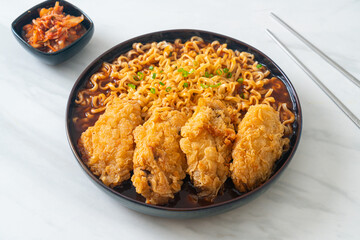 Korean instant noodles with fried chicken or Fried chicken ramyeon