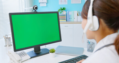 doctor use computer with headset