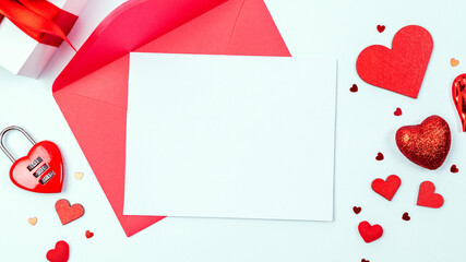 Valentine card. Red heart, romantic gift on love white background with copy space. Valentines day gift decoration. Flatlay banner.