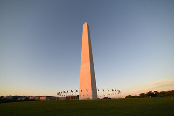 Fototapeta premium Washington Monument construction in sunset light. Landmark of United States of America, Washington DC.