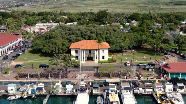 aerial view of historic Old lahaina courthouse by the wharf and banyan tree