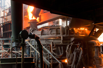 Metallurgical production. Red-hot metal in a vat.