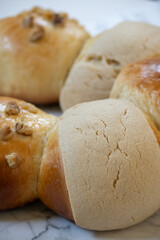 Vertical photo of mexican bread with icing