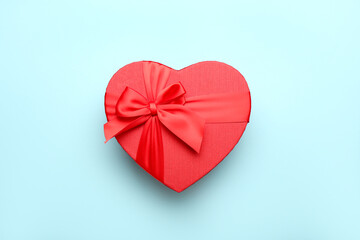 Gift box for Valentine's Day on blue background