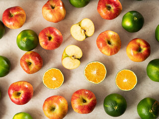 Naklejka na ściany i meble Sliced apples, tangerines and fruits 
