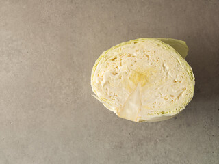 cut cabbage on a gray background 