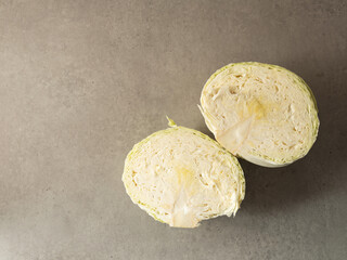 cut cabbage on a gray background 