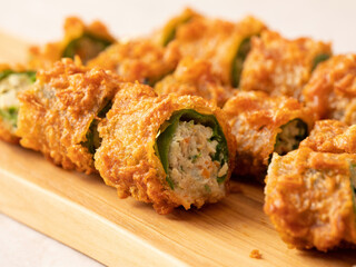 Fried chilli pepper stuffed minced meat and vegetables