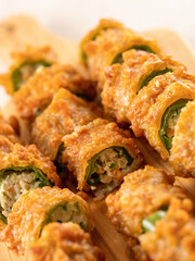 Fried chilli pepper stuffed minced meat and vegetables