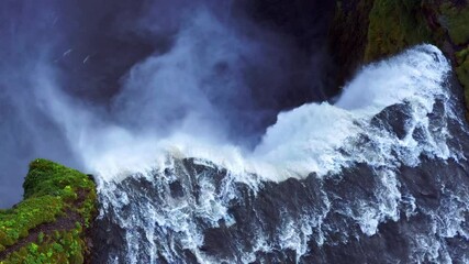 Top View Of The Famous Skogafoss Waterfall In Iceland - aerial drone shot