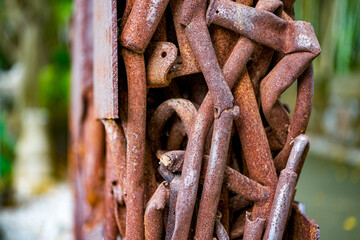 A pile of rusty water pipes and scrap iron twisted together