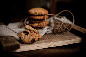 Morning cookies with almonds on the wood board. Selective focus