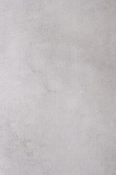 Light grey concrete stone surface paint wall background, Grunge cement paint texture backdrop, Gray rough concrete stone wall background, Copy space for interior design background, banner, wallpaper