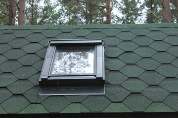 Shingles roof top with sky light window   - 480101532