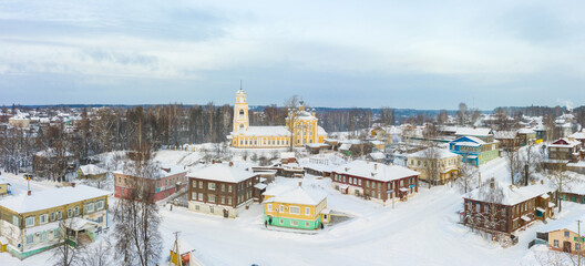 Panorama of a small city in the depths of Russia from a height. Orthodox churches and traditional...