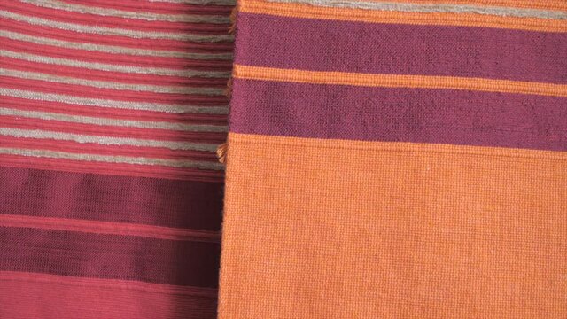red carpet hand made tradition. beautiful rug pattern from Africa. original handmade craft videos without factory intervention.