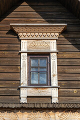 carved window of a wooden house