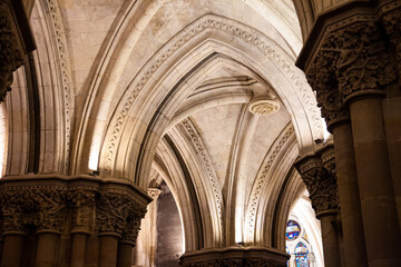 Obraz premium Interior pillars and masonry of a cathedral with stained glass windows