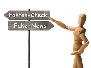 Wegweiser Fakten-Check oder Fake-News mit Gliederfigur